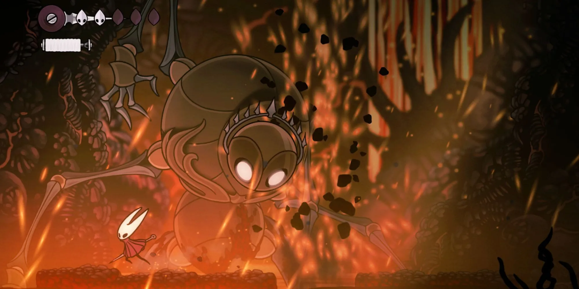 Hình ảnh gameplay Hollow Knight Silksong, mô tả nhân vật Hornet chiến đấu trong bối cảnh hang động bí ẩn
