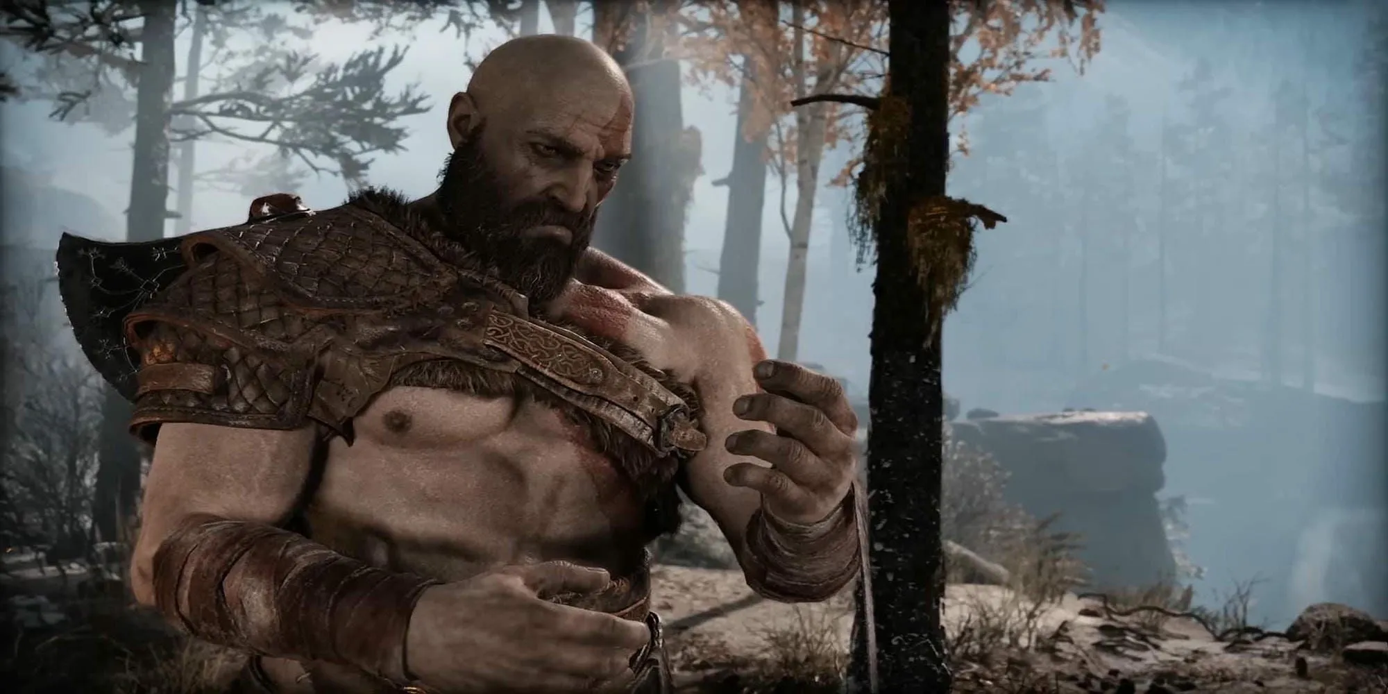 Kratos trầm ngâm trong God of War 2018