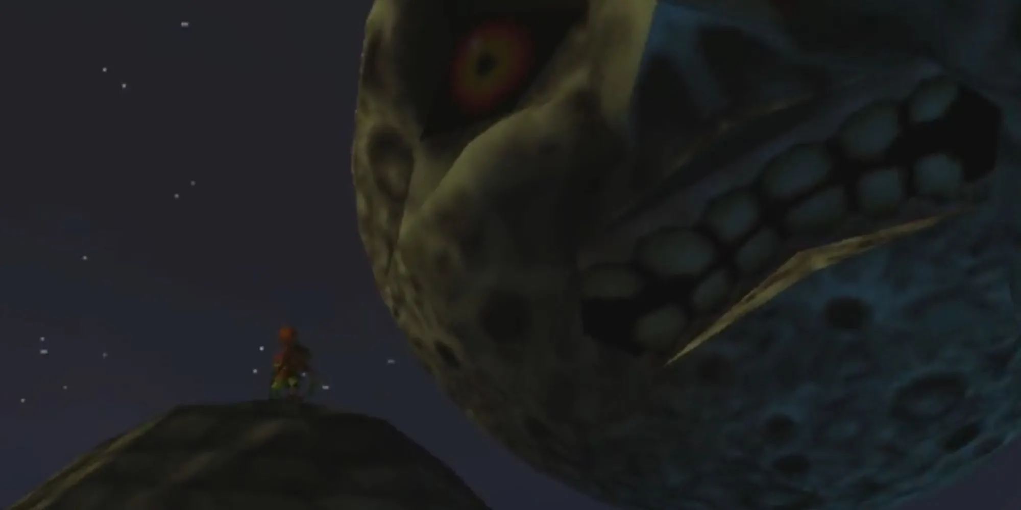 Link đeo mặt nạ Majora trong The Legend of Zelda: Majora's Mask, tựa game phiêu lưu hành động độc đáo của Nintendo 64.