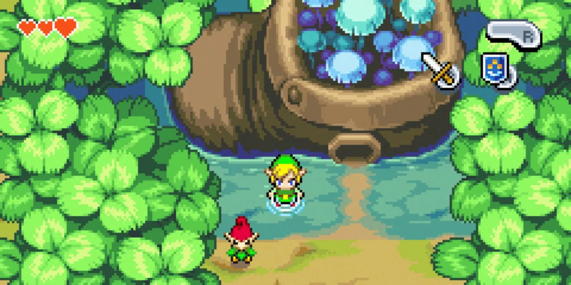 Link và một Picori đứng bên ngoài một ngôi nhà làm từ chiếc giày trong The Legend of Zelda: The Minish Cap