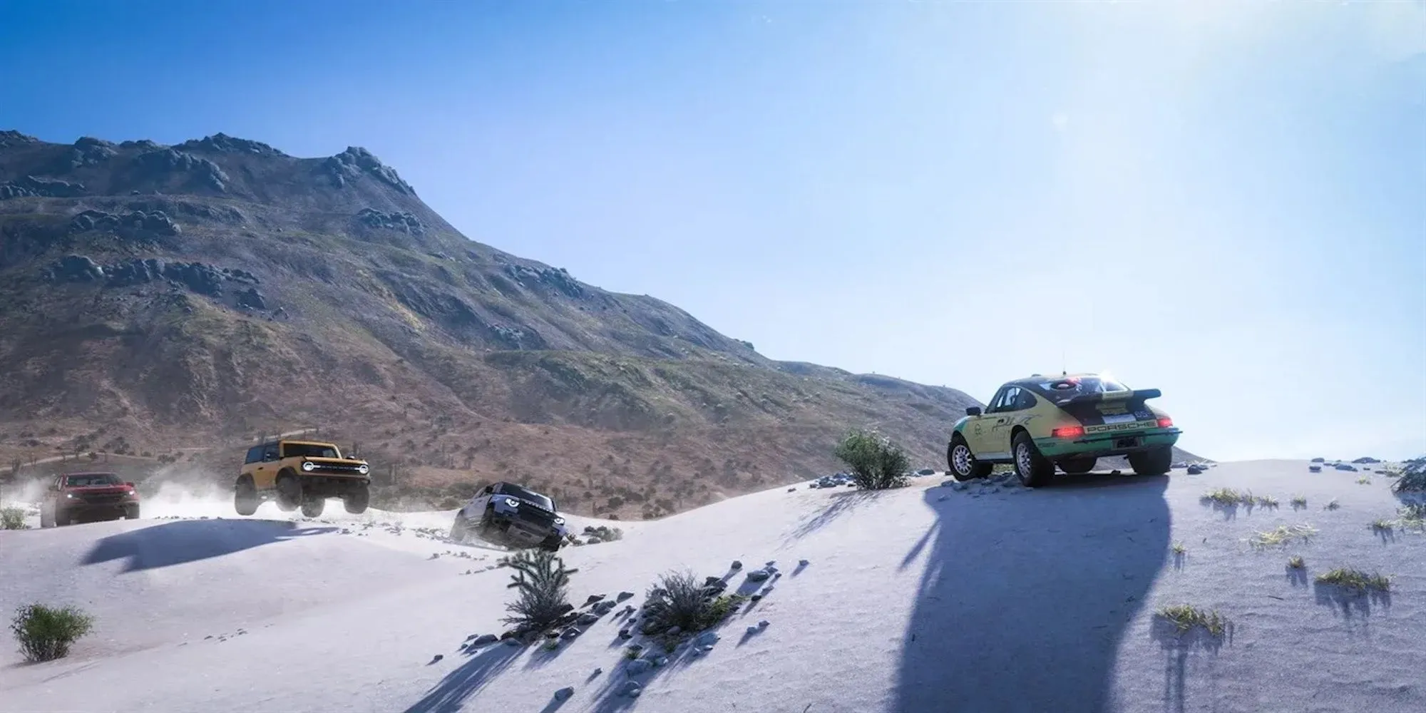 Một chiếc siêu xe đang bay qua một đoạn dốc lớn trong thế giới mở tuyệt đẹp của Forza Horizon 5