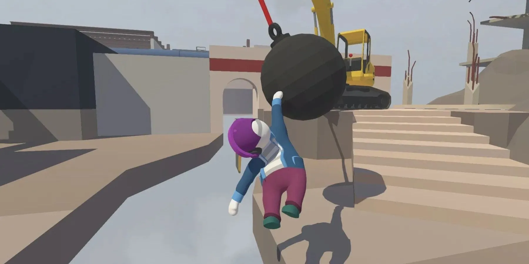 Một nhân vật hình nộm trong Human: Fall Flat đang cố gắng leo trèo trong một màn chơi đầy màu sắc