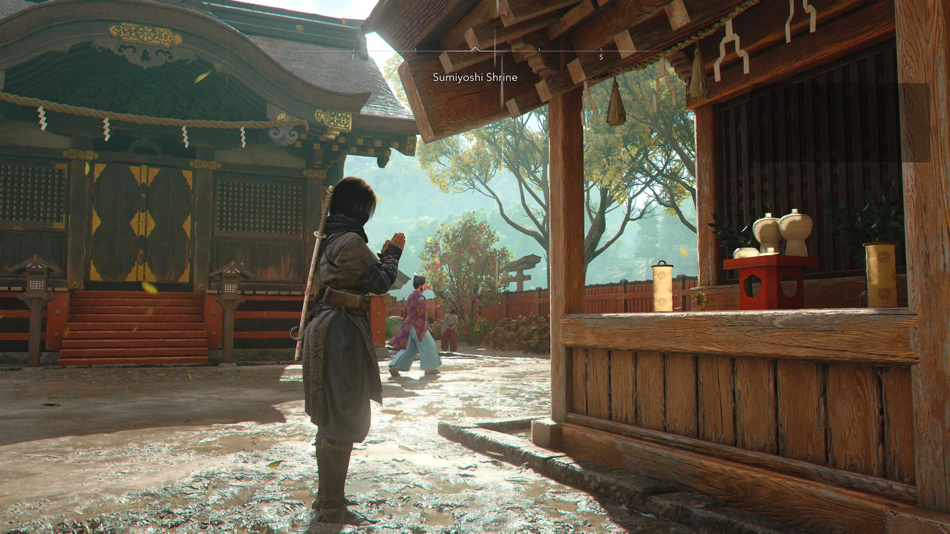 Nhân vật Yasuke đang cầu nguyện tại một ngôi đền trong Assassin's Creed Shadows để nhận buff Adrenaline.