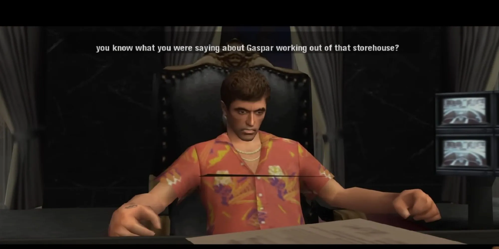 Tony Montana ngồi tại bàn làm việc trong game Scarface The World Is Yours