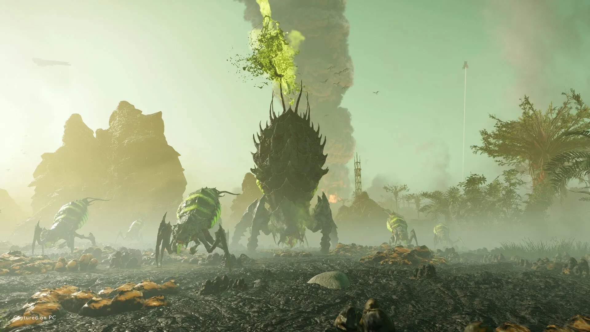 Nhân vật Helldiver đứng trước một công trình trong game.