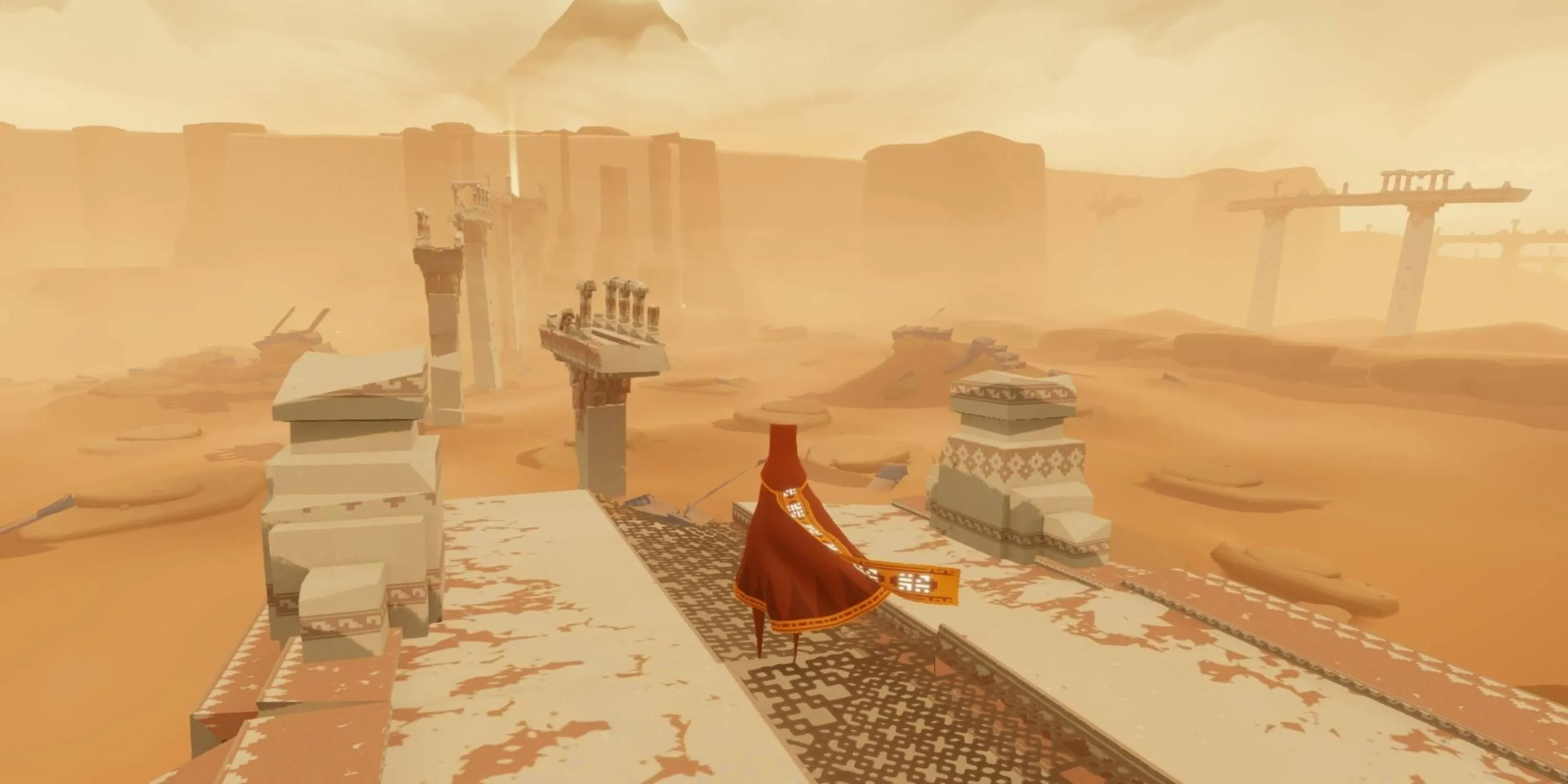 Dáng hình ẩn mình trong chiếc áo choàng đỏ vượt sa mạc bao la trong game Journey