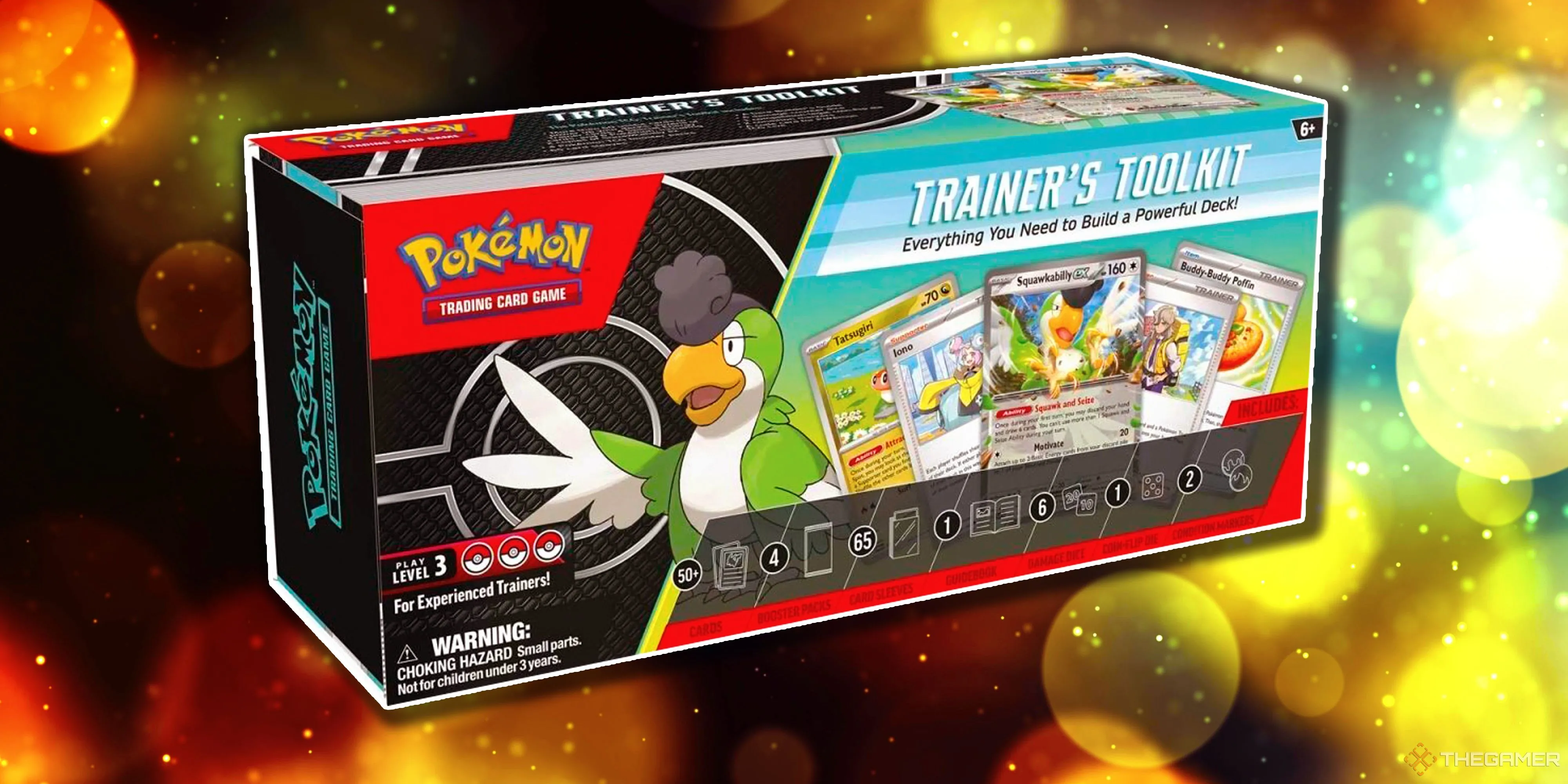Hộp Pokemon TCG Trainer’s Toolkit 2024 màu xanh lá cây với logo Scarlet &amp; Violet, chứa các thẻ bài và pack để hỗ trợ người chơi xây dựng deck Paldean.