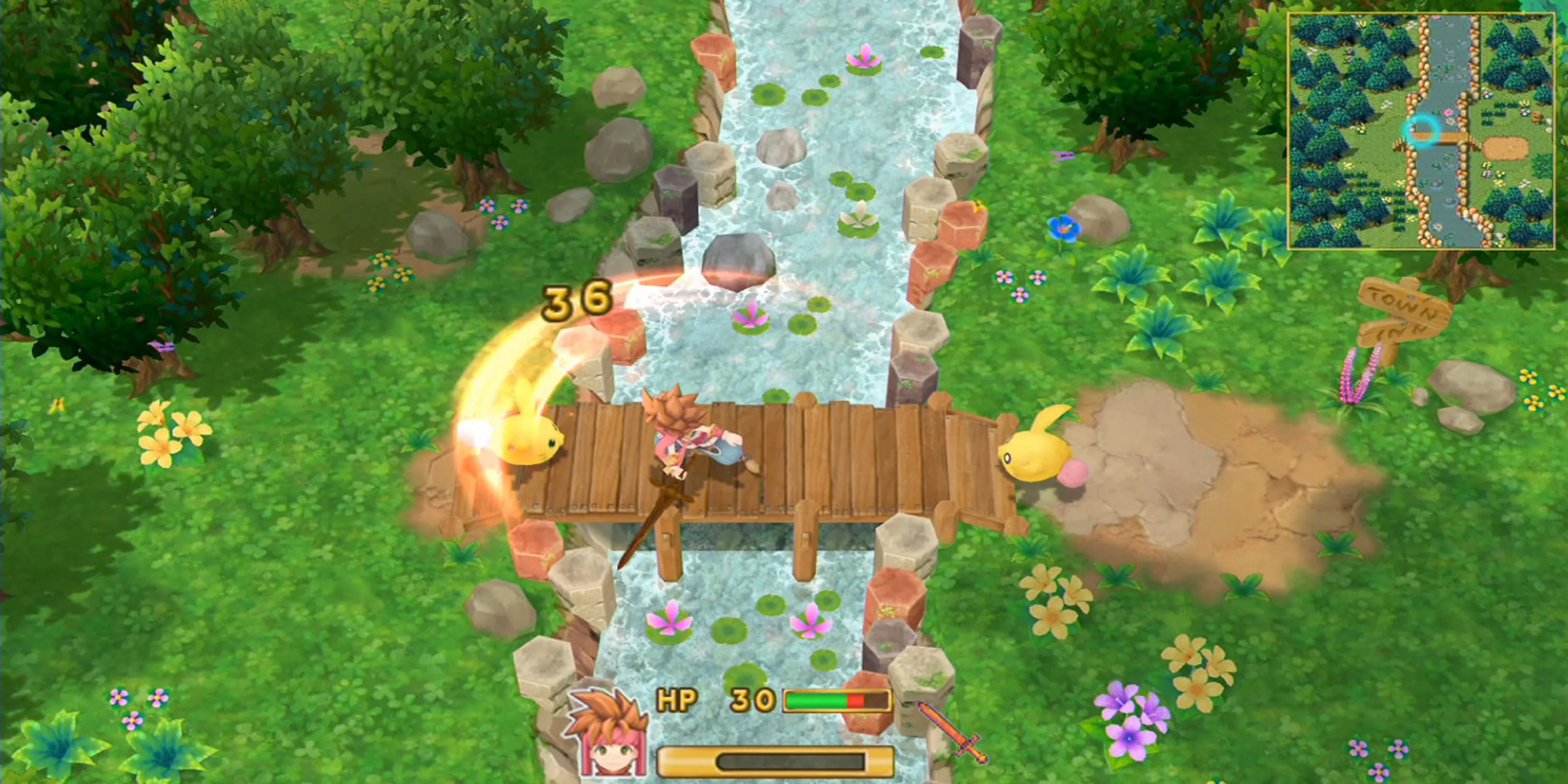 Người chơi vung kiếm tấn công kẻ thù trong trận chiến thời gian thực của Secret of Mana (2018)